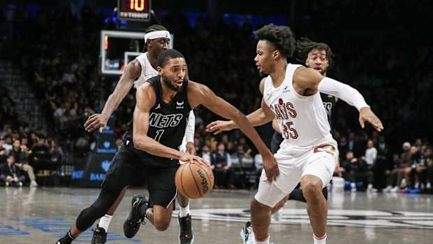 Brooklyn Nets forward Mikal Bridges (1) looks to drive past Cleveland Cavaliers forward Isaac Okoro (35) in the third quarter at Barclays Center.